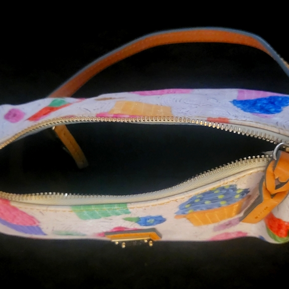 Pre-Loved Dooney and Bourke Small Barrel Bag in Cupcake Pattern with Wallet. - Picture 2 of 6